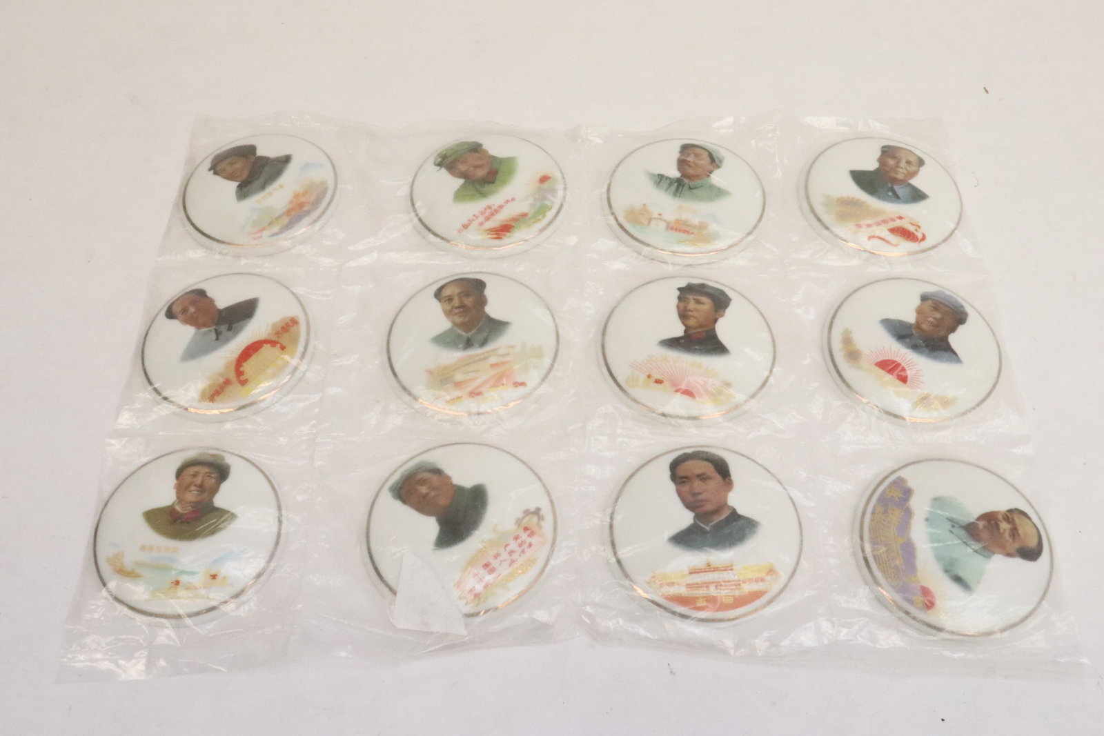 12 survenir buttons: 12 survenir buttons, 0.2"x2.35"dia ea