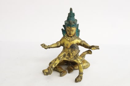 a gilt metal deity