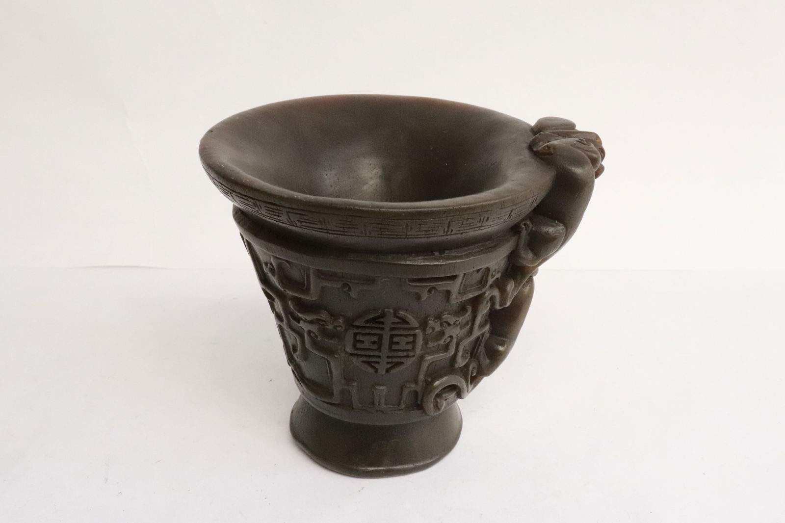 A simulated horn libation cup (1 of 9)