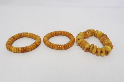 3 amber like bead bracelets