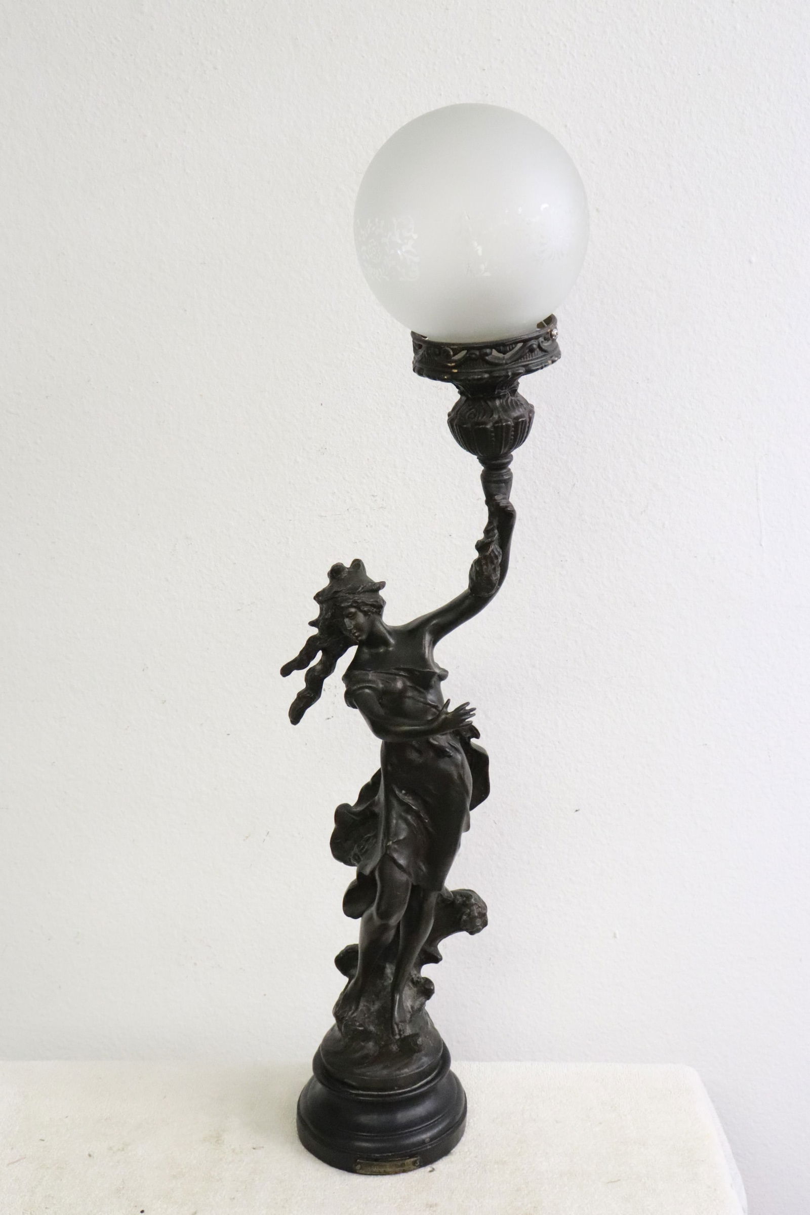A resin molded base lamp in goddess motif: A resin molded base lamp in goddess motif, 29.5"H