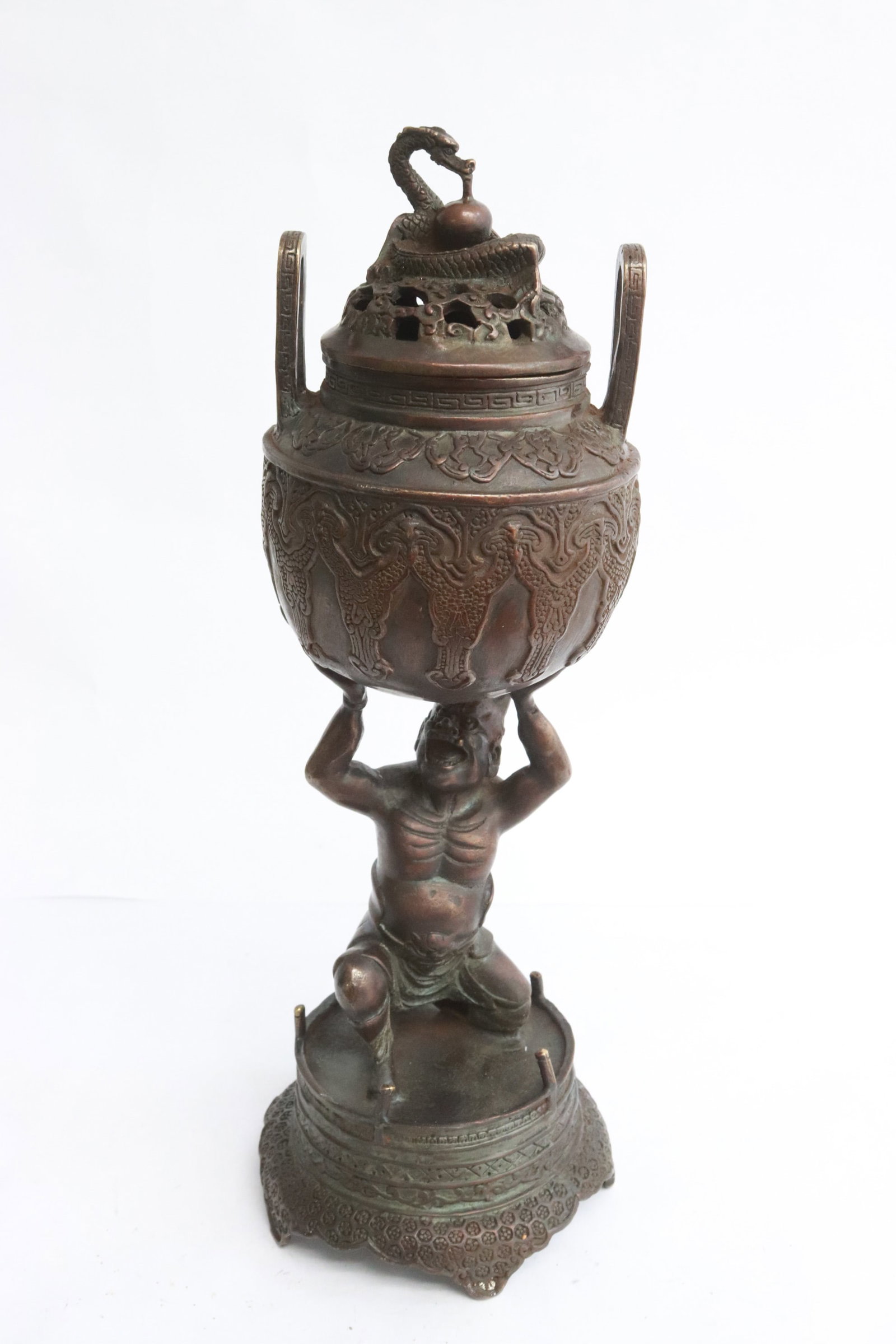 A fancy bronze tall censer with deity motif base: A fancy bronze tall censer with deity motif base, 11.35"H