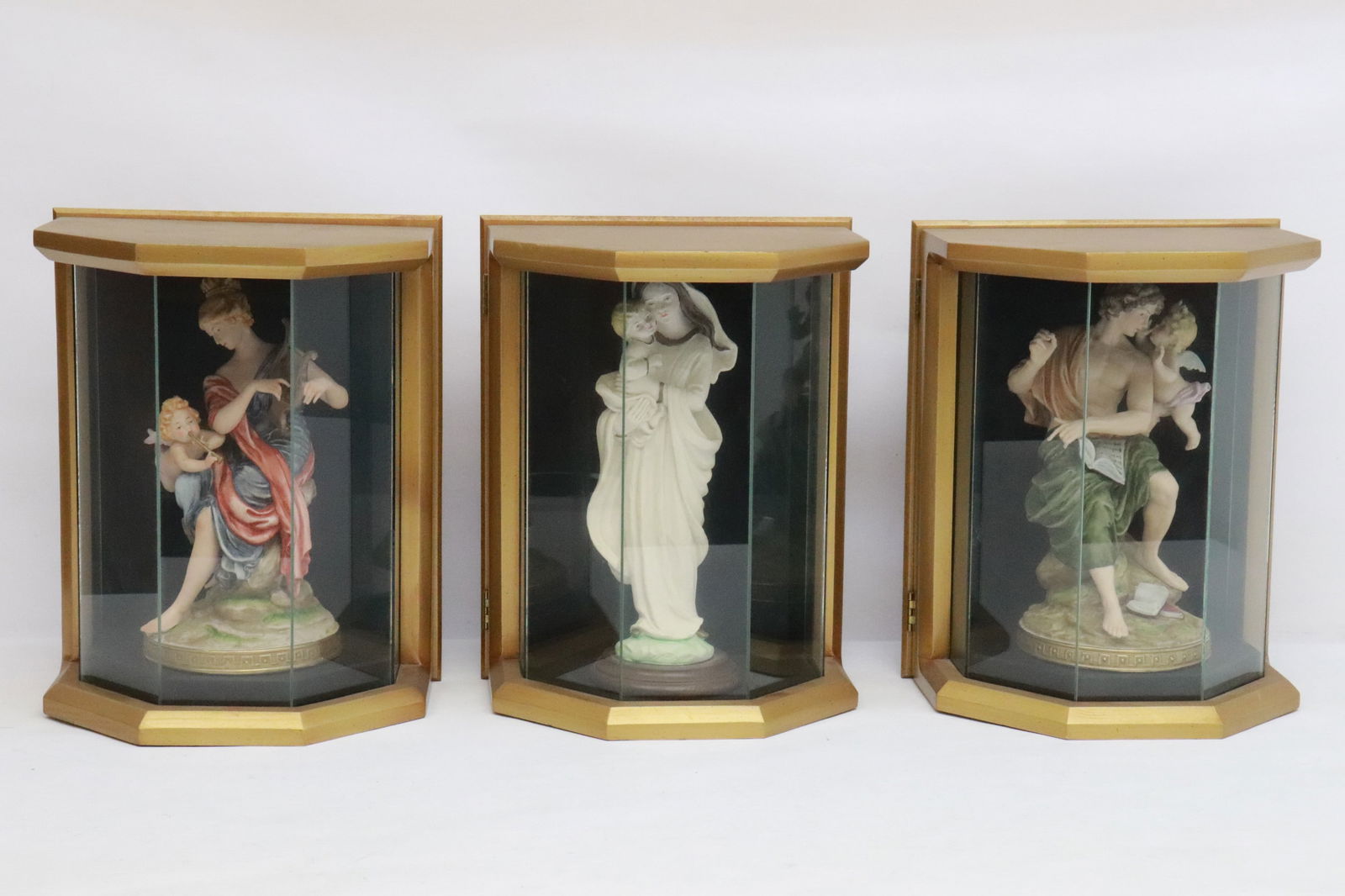 3 bisque sculptures in wall hanging shadow boxes (1 of 12)