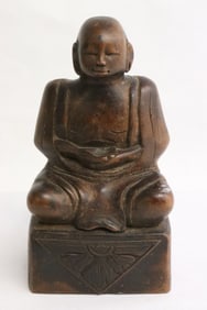 A 19th century Chinese wood carved deity