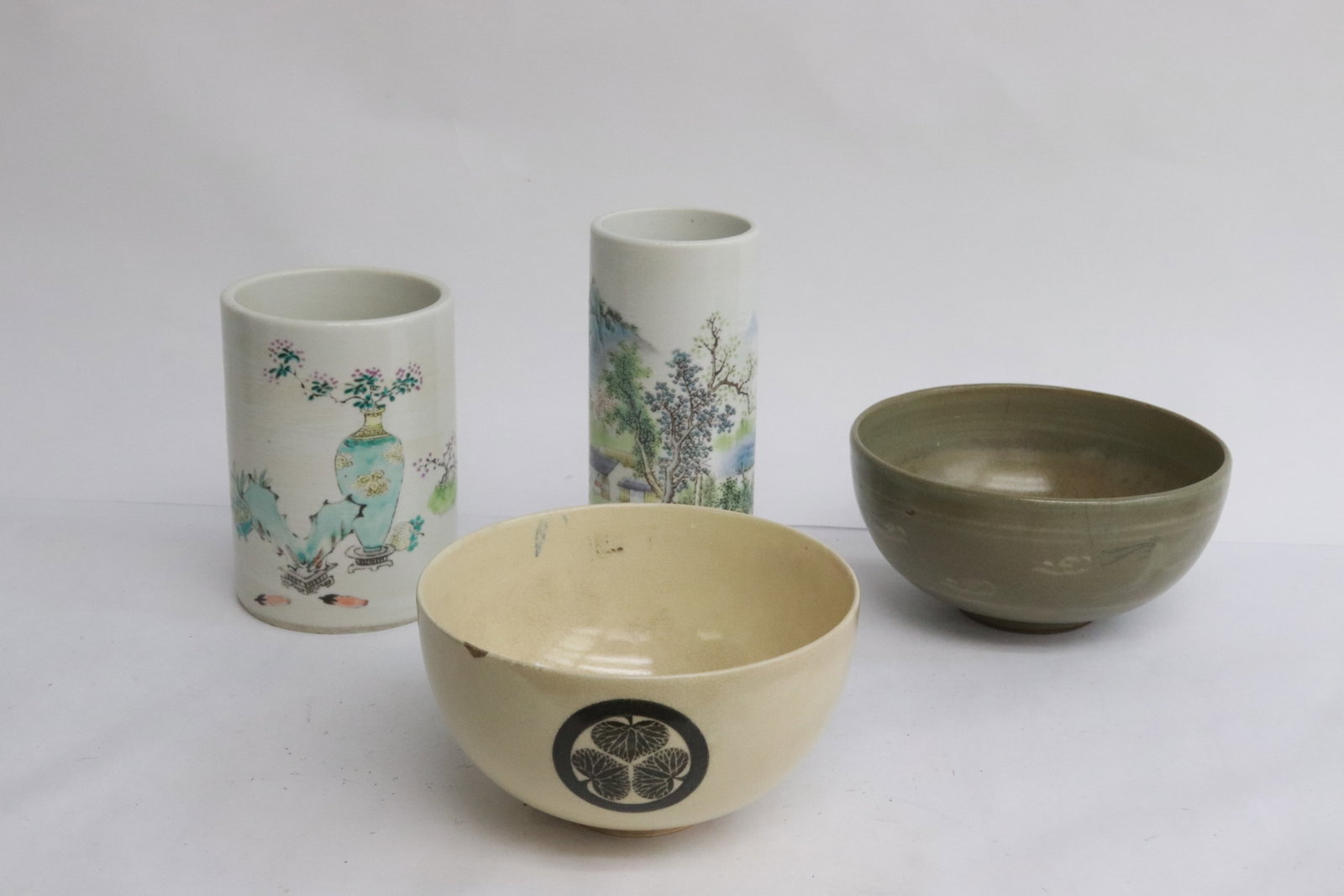 4 porcelain pieces: 4 pieces; 2 famille rose porcelain incense holders (4"x2.85"dia, 4.95"x2.1"dia), and 2 Asian porcelain bowl (2.35"x4.7"dia, 2.5"x4.35"dia)