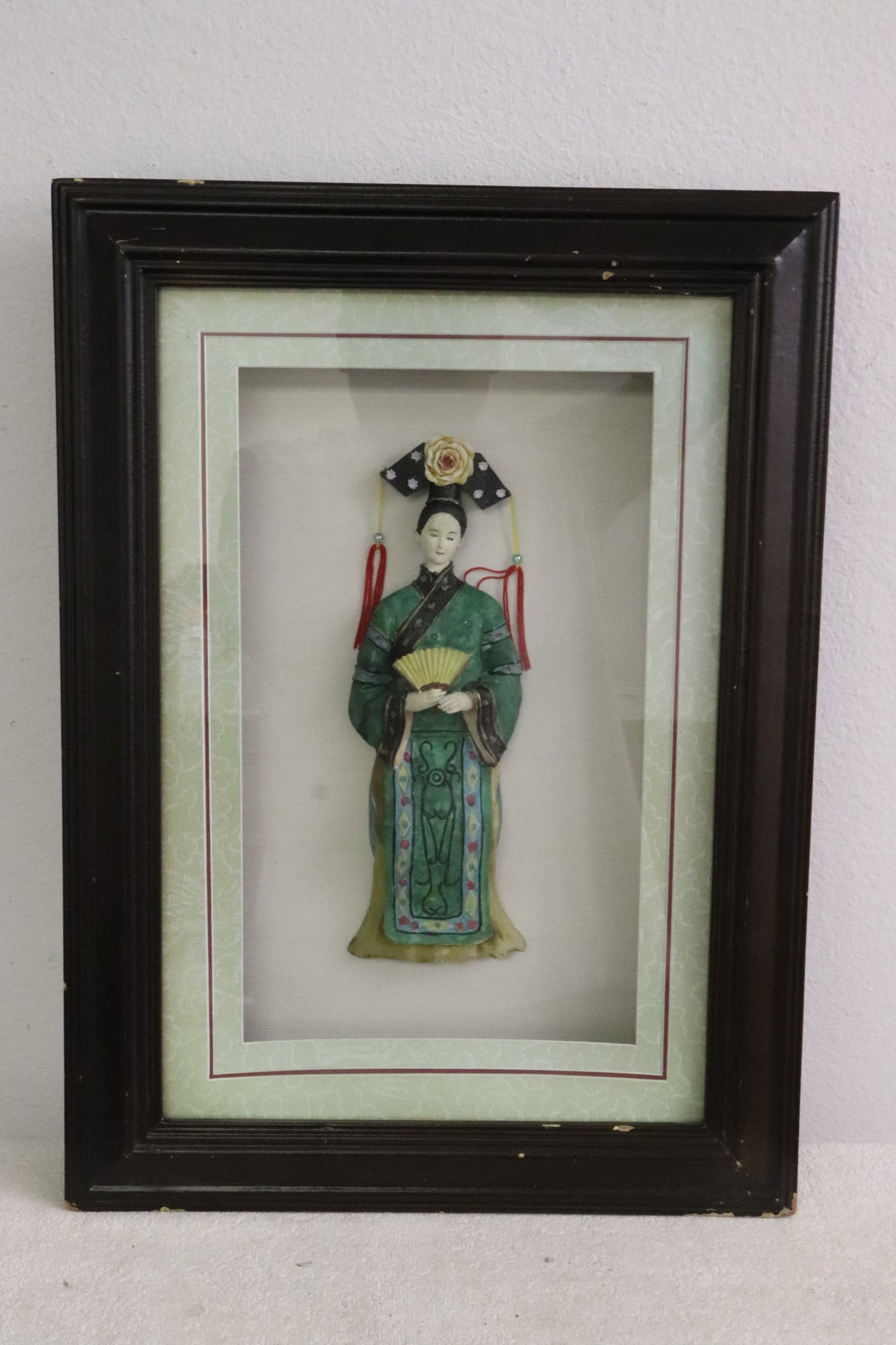 A painted Chinese figure display in shadow box (1 of 7)
