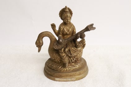 Antique bronze sculpture of deity