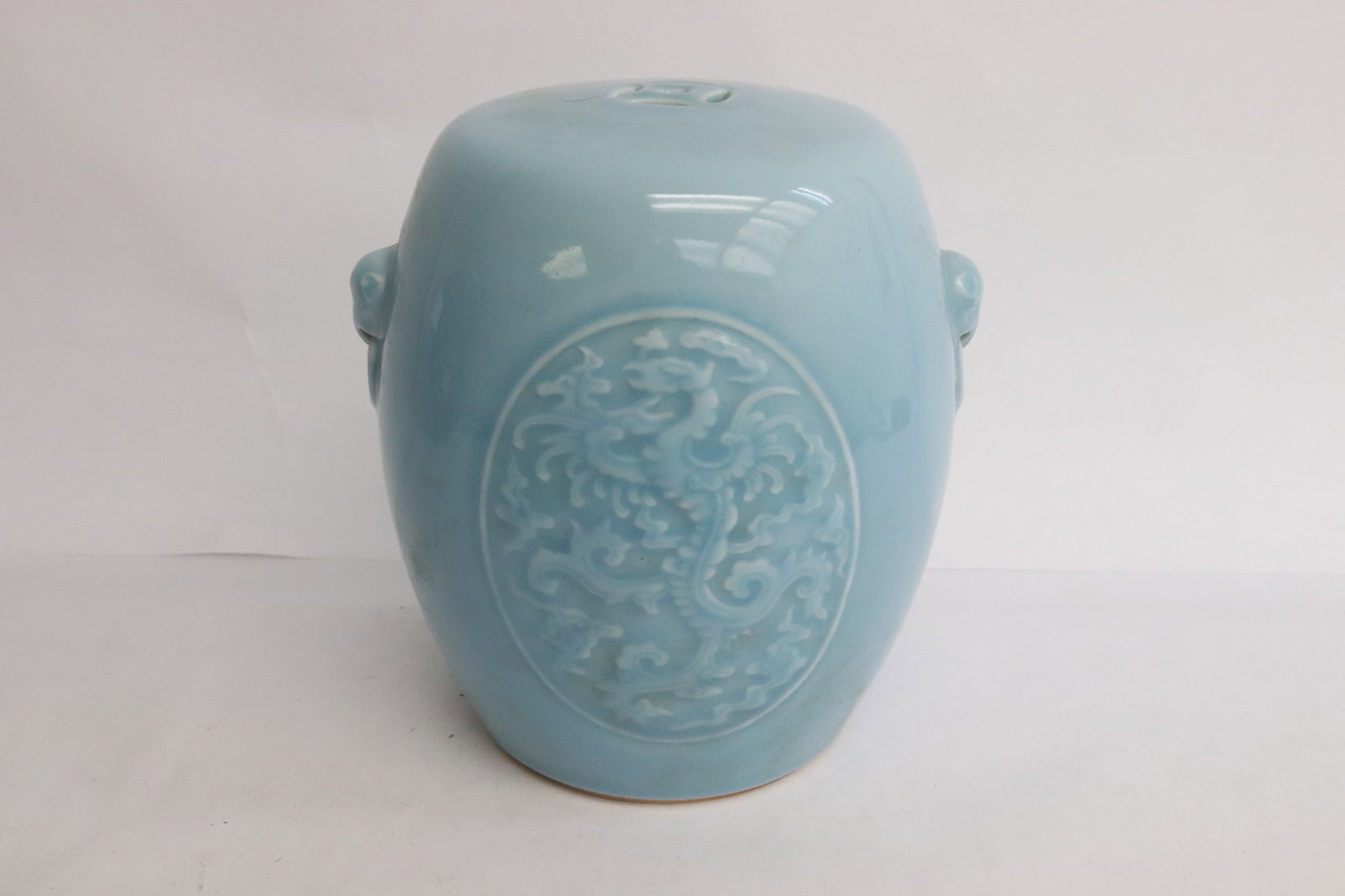 Beautiful light blue porcelain drum: Beautiful light blue porcelain drum embossed with dragon motif decoration, 6.65"x6.3"x5.8"