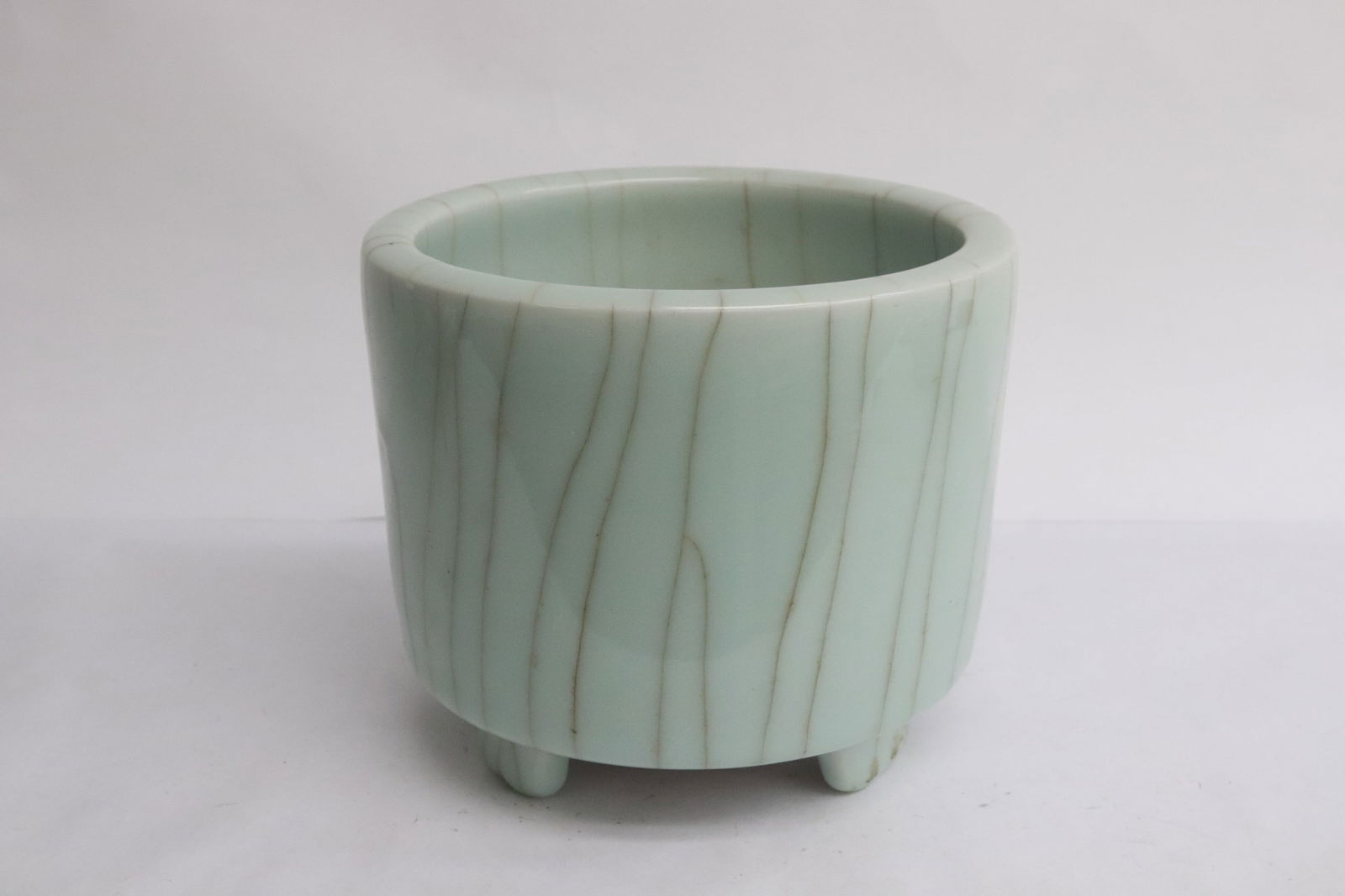 A celadon crackleware porcelain tripod censer: A celadon crackleware porcelain tripod censer, 5.3"x6"dia