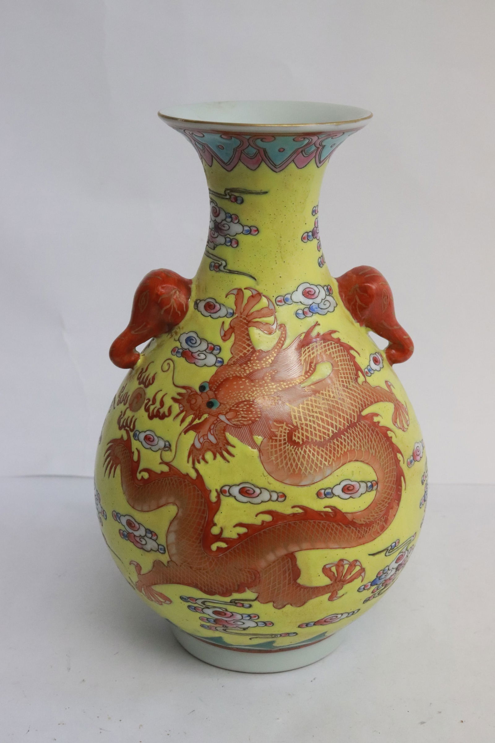 Chinese yellow background famille rose vase: Chinese yellow background famille rose porcelain vase, 7.8"x4.9"dia