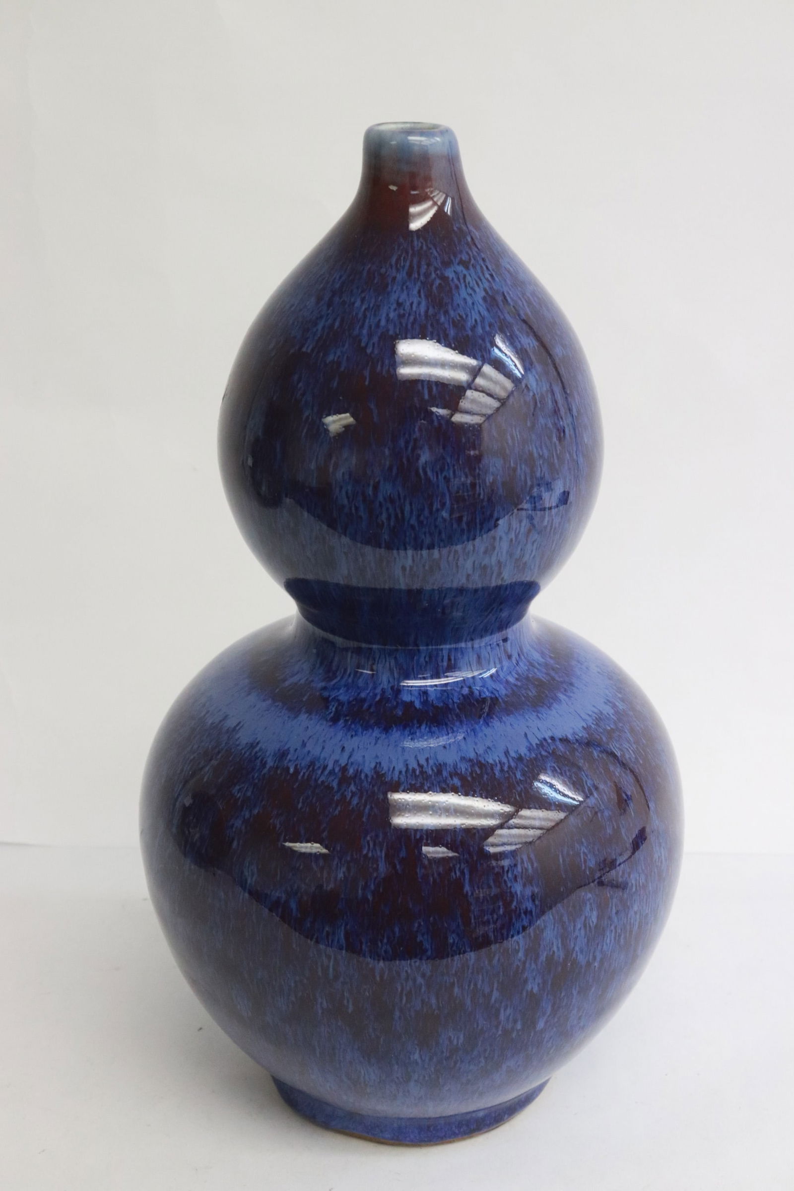 Fine blue on purple gourd shape porcelain vase (1 of 9)