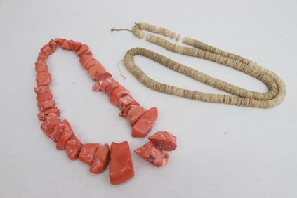 a coral bead necklace, and a shell bead necklace