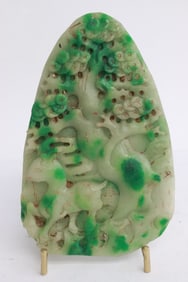 Large jadeite like stone ornament