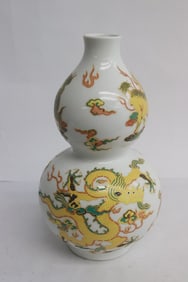 An enamel on porcelain gourd shape vase