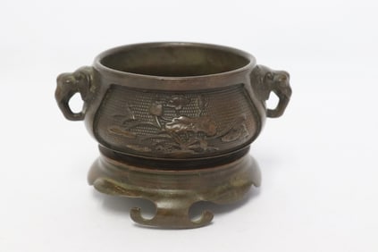 A bronze censer with bronze stand