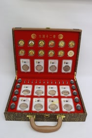 Case of souvenir coins and currency
