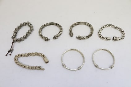 7 white metal bracelets