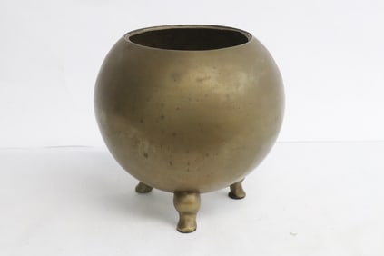 A vintage Chinese tripod censer