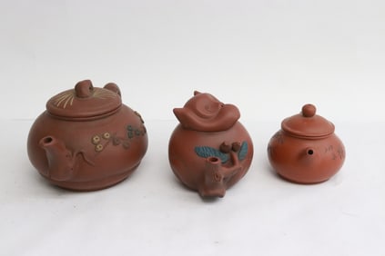 3 Yixing teapots
