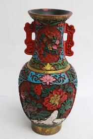 A cinnabar style vase