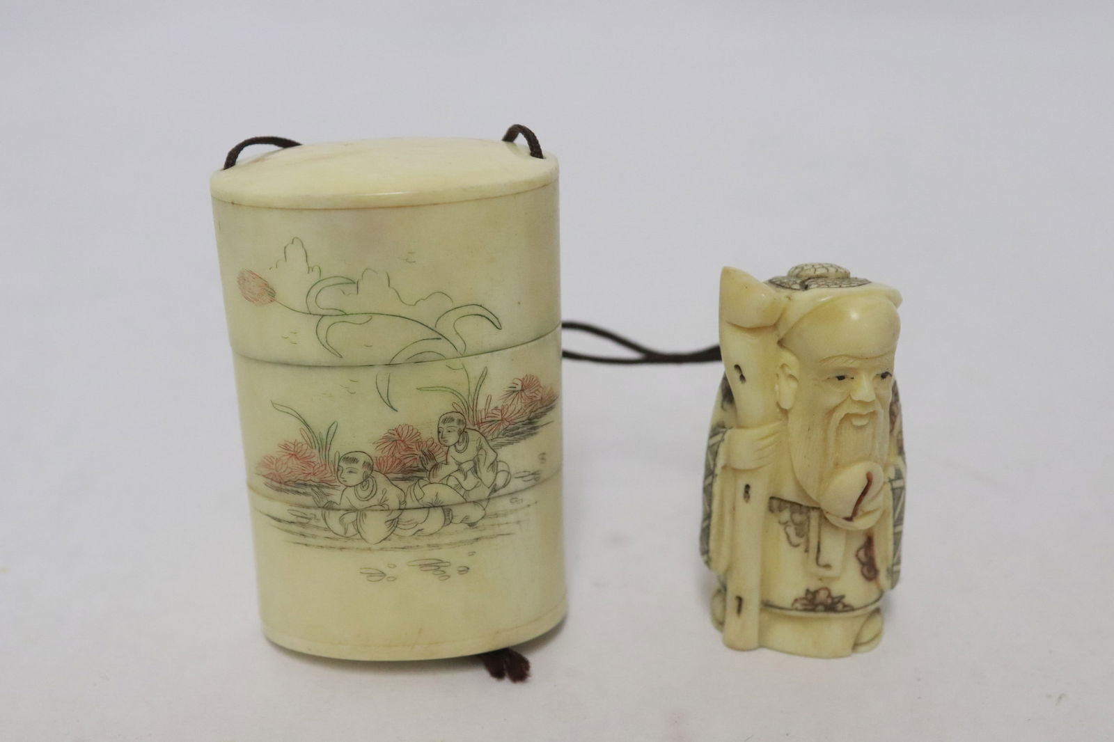 Bone carved inro, and a bone carved netsuke: Bone carved inro (2.6"x1.68"x1.15"), and a bone carved netsuke (2.1"H)