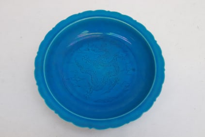 Bright blue glazed porcelain plate