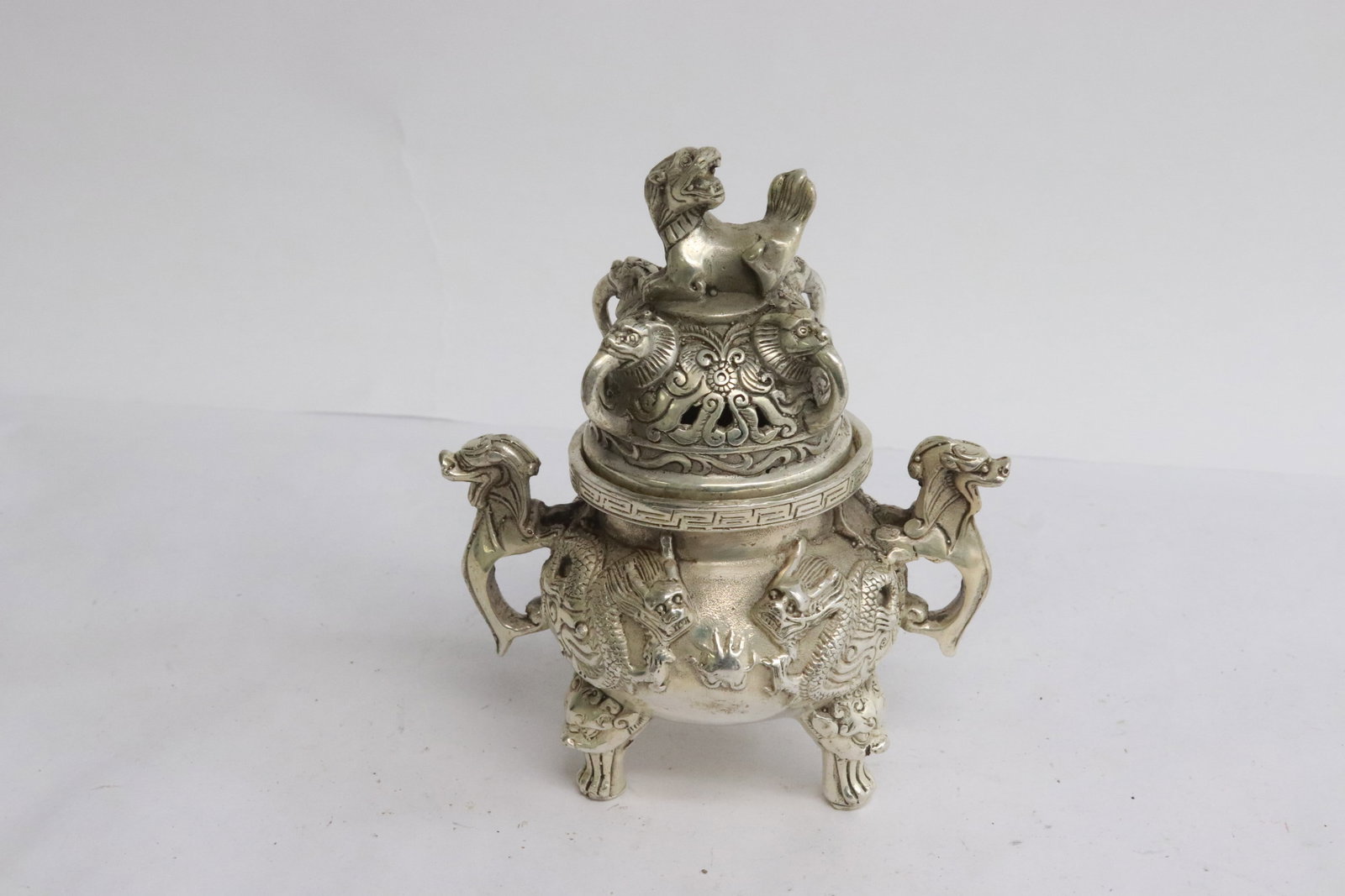 An ornate white bronze censer: An ornate white bronze censer, 5.3"x4.3"x2.9"