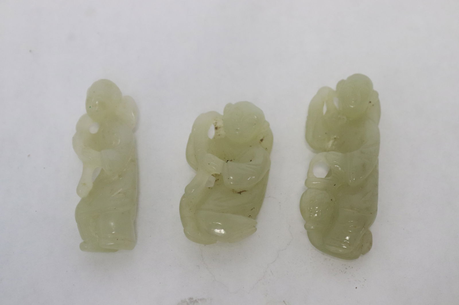 3 jade like stone carved ornaments: 3 jade like stone carved ornaments, 1.6"H - 2"H