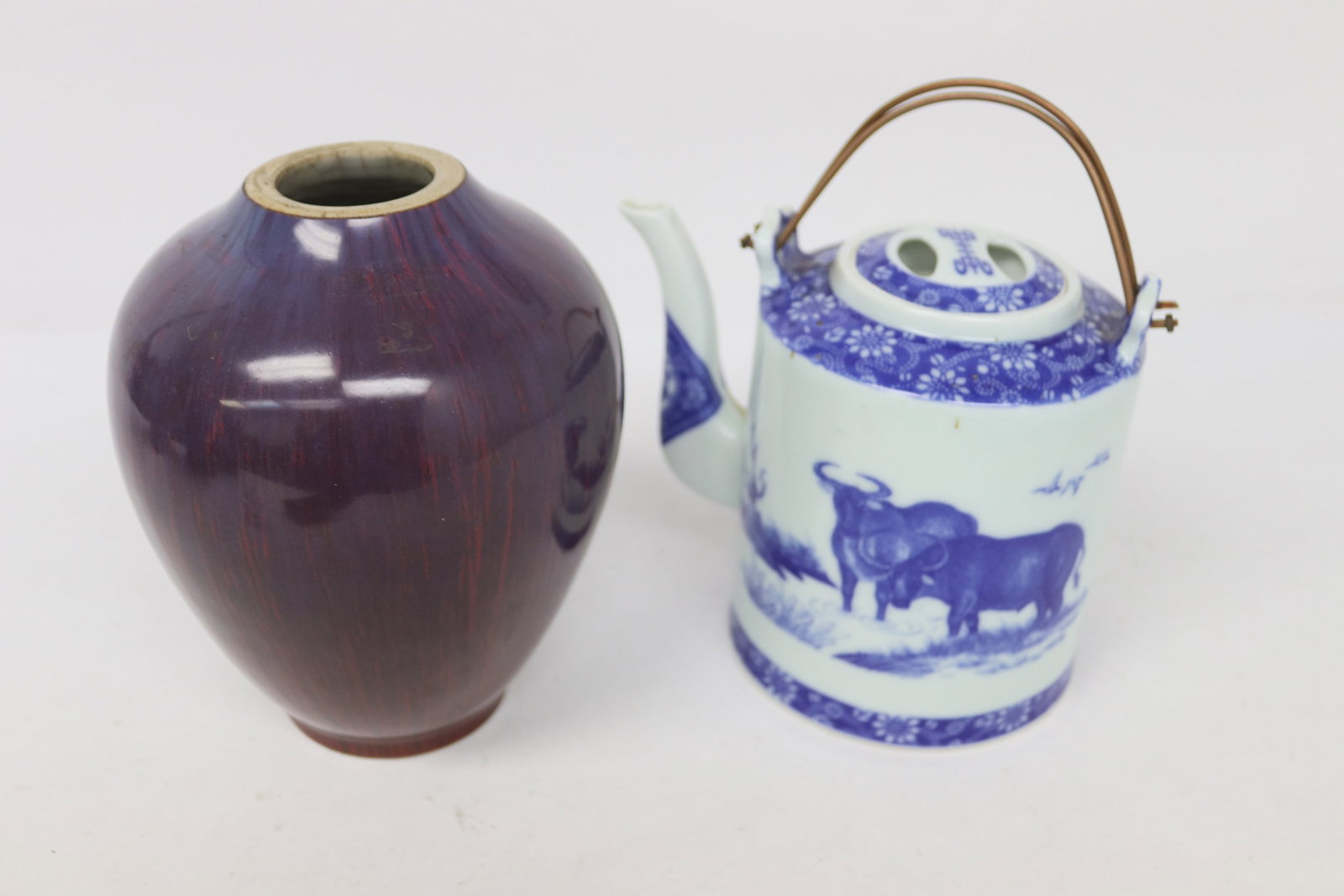 2 teapots; a bronze, and a cast iron examples (1 of 6)