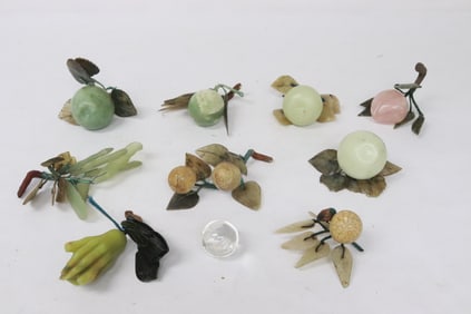 Lot of stone carved fruits