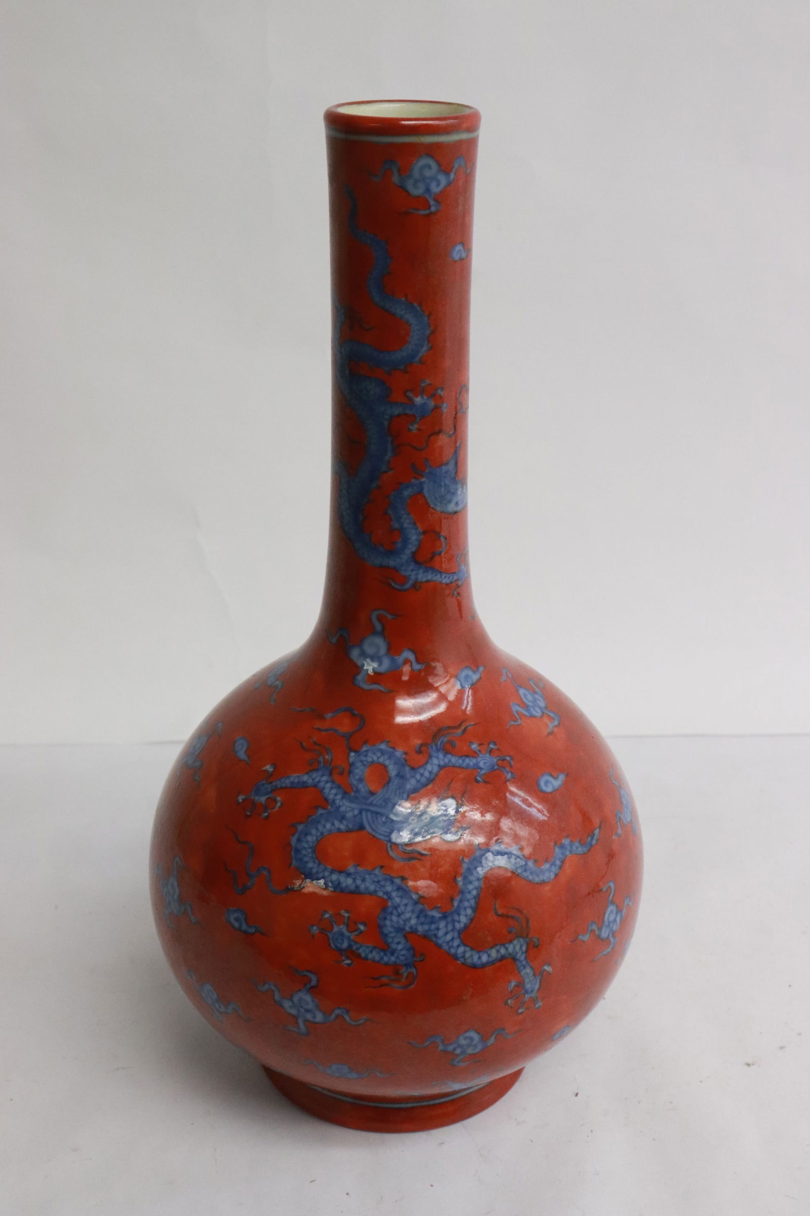 Fine Chinese blue on red porcelain bottle vase: Fine Chinese blue on red porcelain bottle vase, 9.8"x5.15"dia