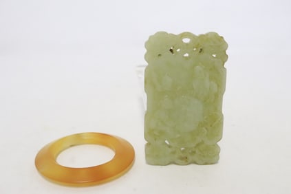 a jade like stone carved plaque, & an agate like disc