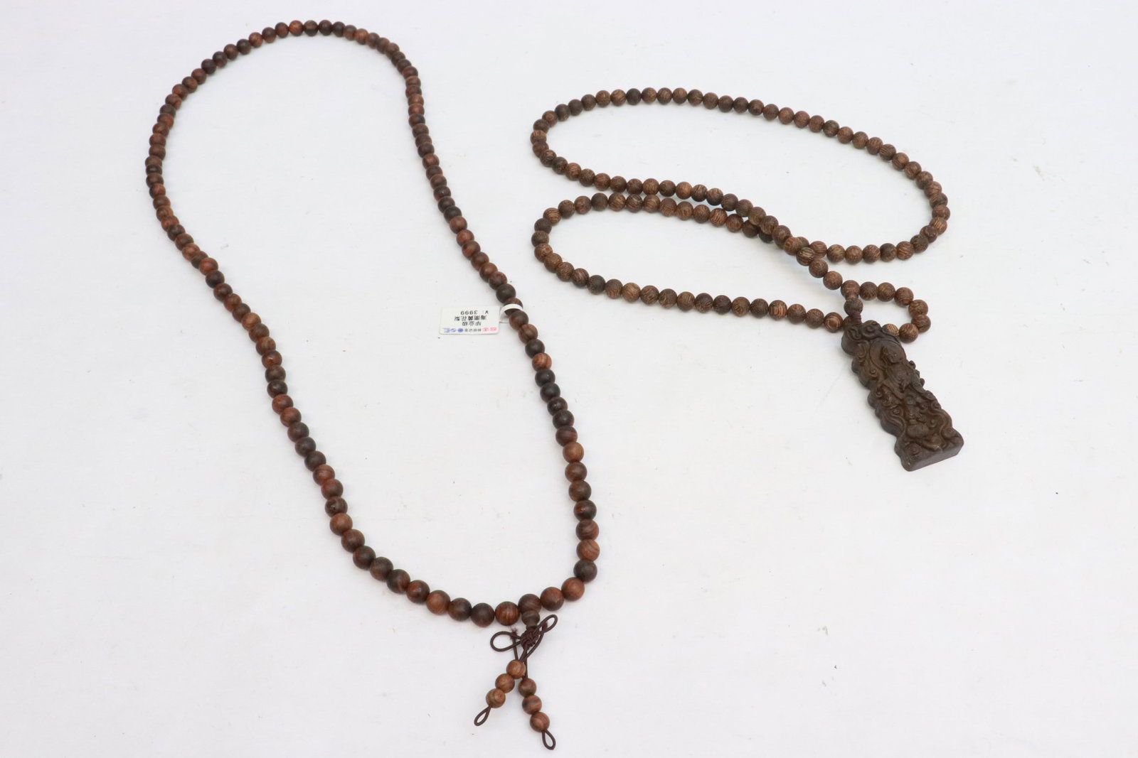 2 huanghuali like wood bead necklaces: 2 huanghuali like wood bead (0.33"x0.33"dia ea) necklaces (34"L, 34.2"L)