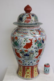 A massive Chinese famille rose covered jar