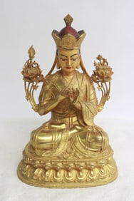 A very fine Chinese gilt bronze sculpture of deity