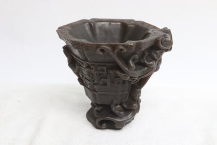 Horn like libation cup
