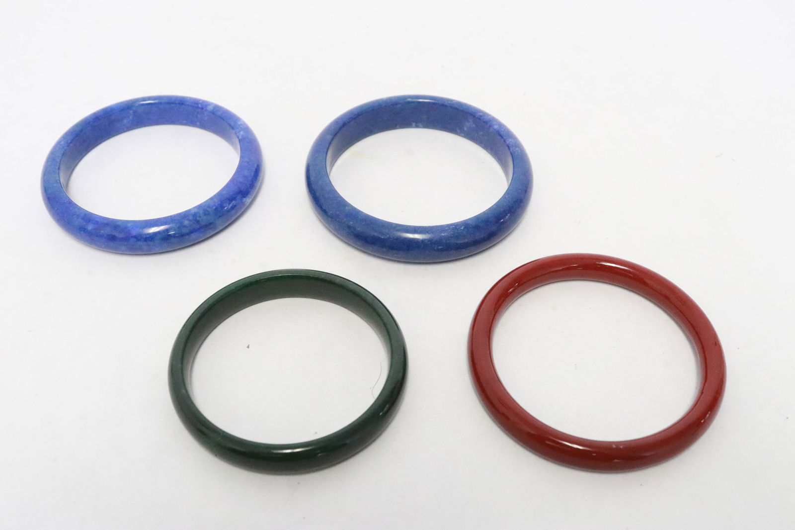 2 lapis like bangles, and 2 stone bangles: 4 pieces (0.38"x2.8"dia - 0.55"x3.2"dia); 2 lapis like bangles, and 2 stone bangles