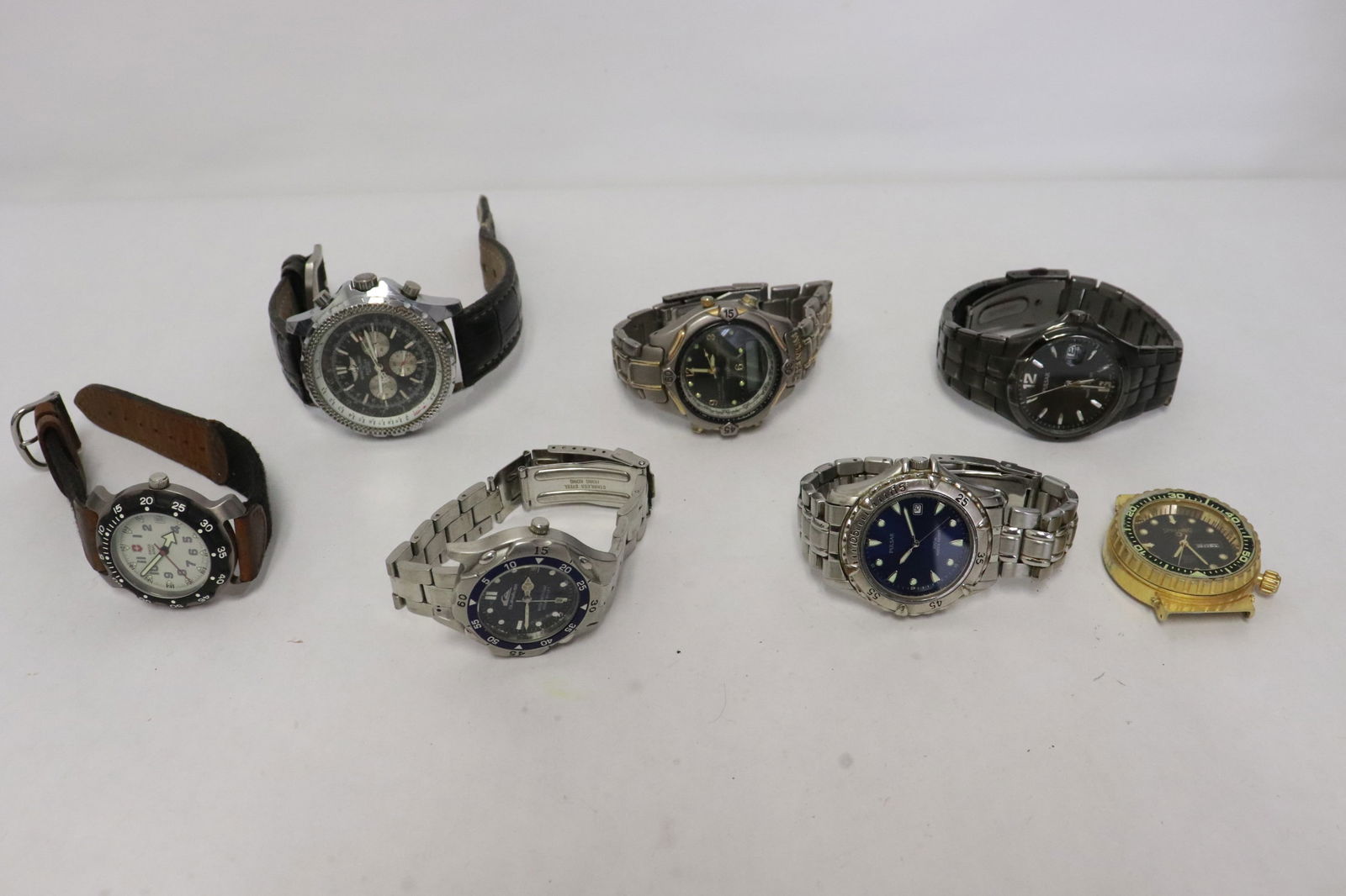 7 men's watches: 7 men's watches, condition unknown