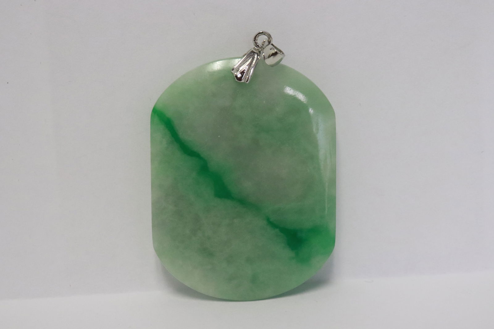 A light apple green jadeite pendant (1 of 5)