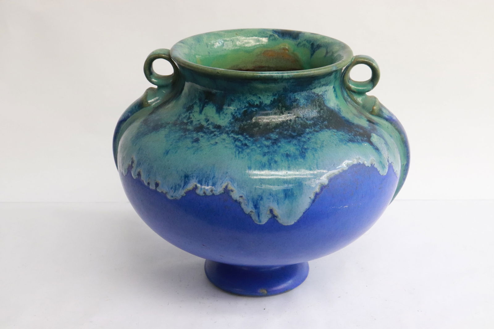 A large early 1900 flambe' pottery jar by Fulper: A large early 1900 art nouveau bright blue flambe' pottery jar by Fulper, 7.6"x9.3"x8.7"