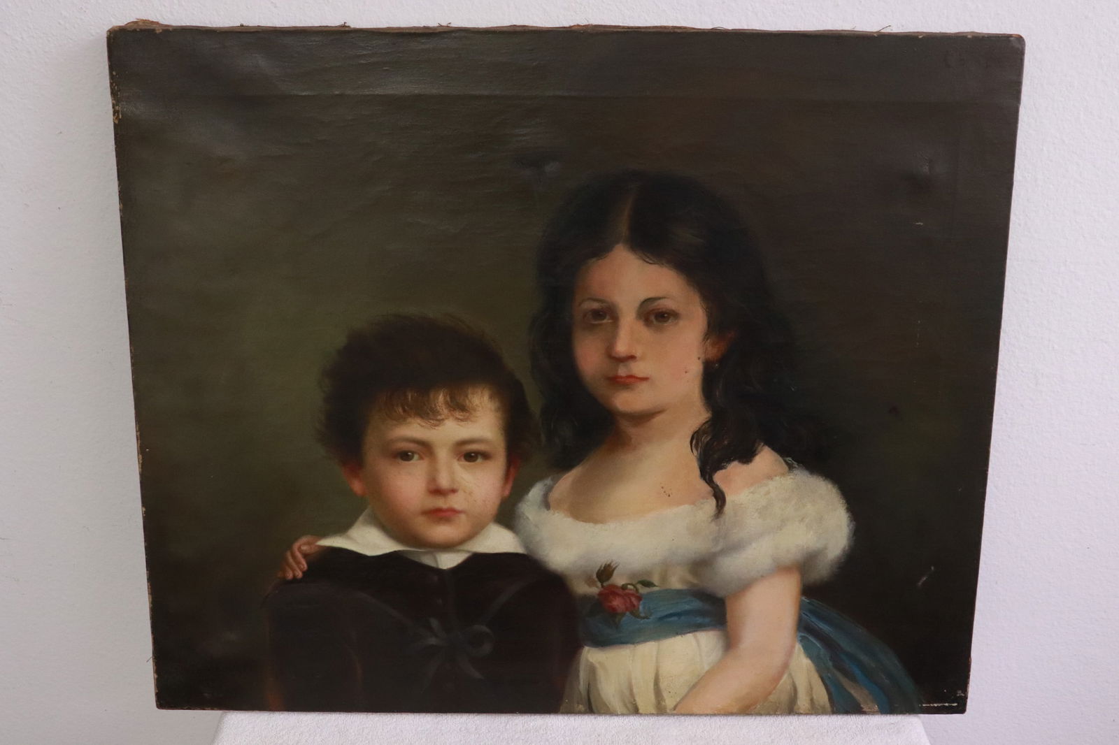 European 19th century oil on canvas painting: European 19th century oil on canvas painting depicting girl and boy, a small repair on top, 21.7"x26.7"