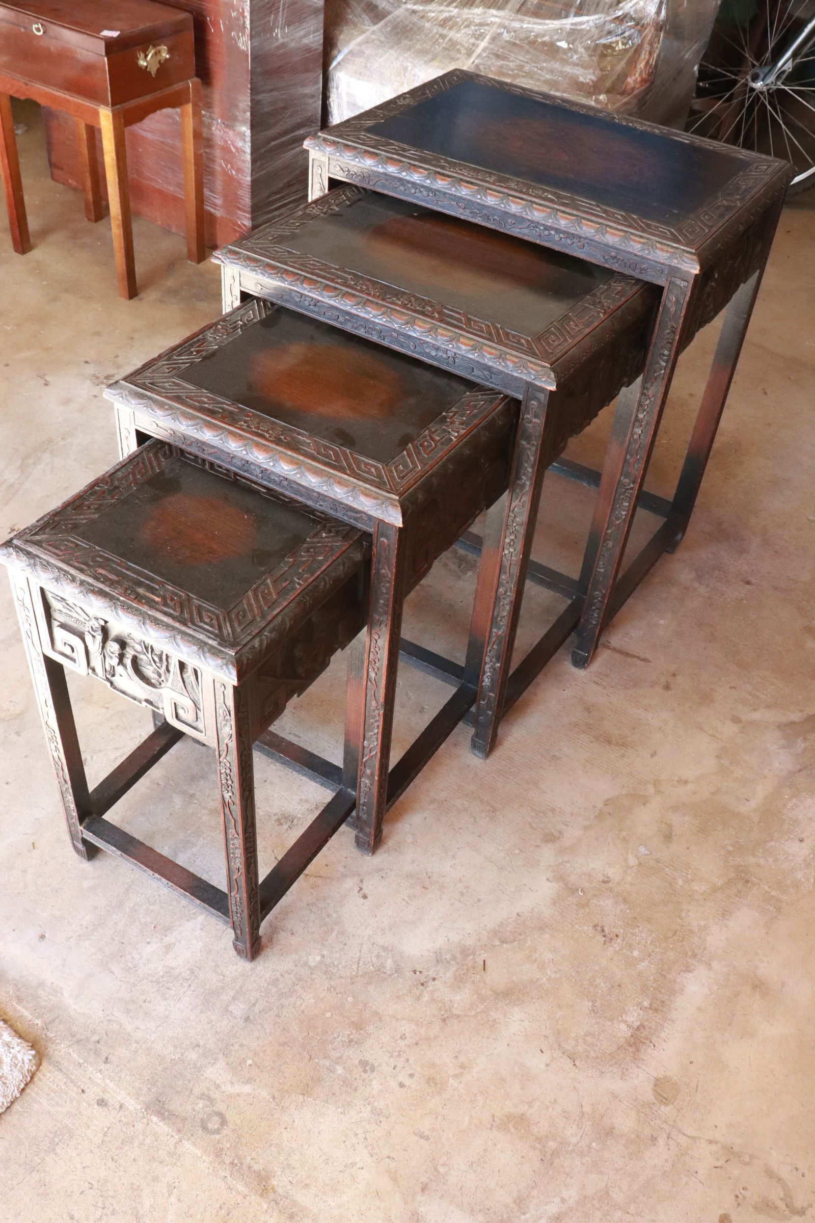 4 pc Chinese antique finely carved nesting table set: 4 pieces Chinese antique finely carved nesting table set, 19.7"x11.6"x9.8" - 26"x21"x14.5"