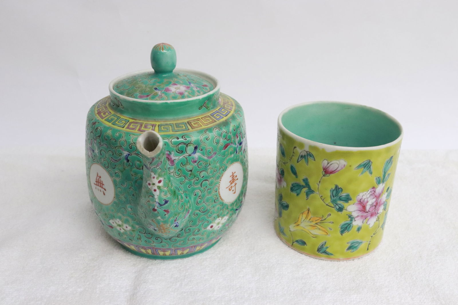 famille rose teapot, and famille rose pitcher: 2 pieces; famille rose teapot (5.65"x6.9"x4.1"), and famille rose pitcher (3.5"x4.2"x3.4")