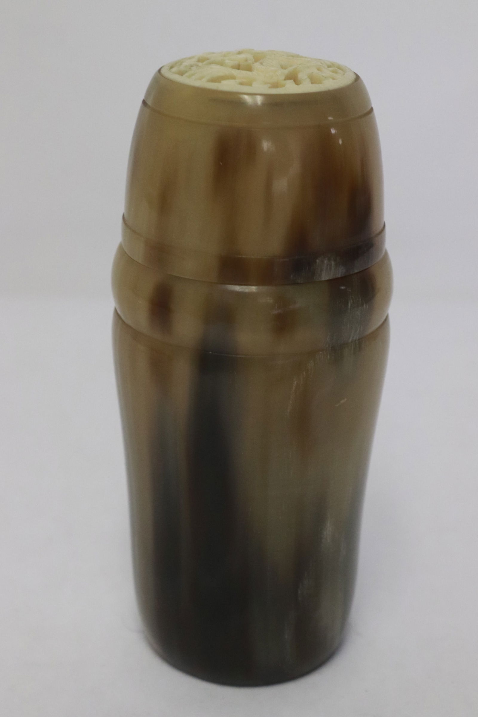 A horn and bone cricket box: A horn and bone cricket box, 4.75"x2.1"dia