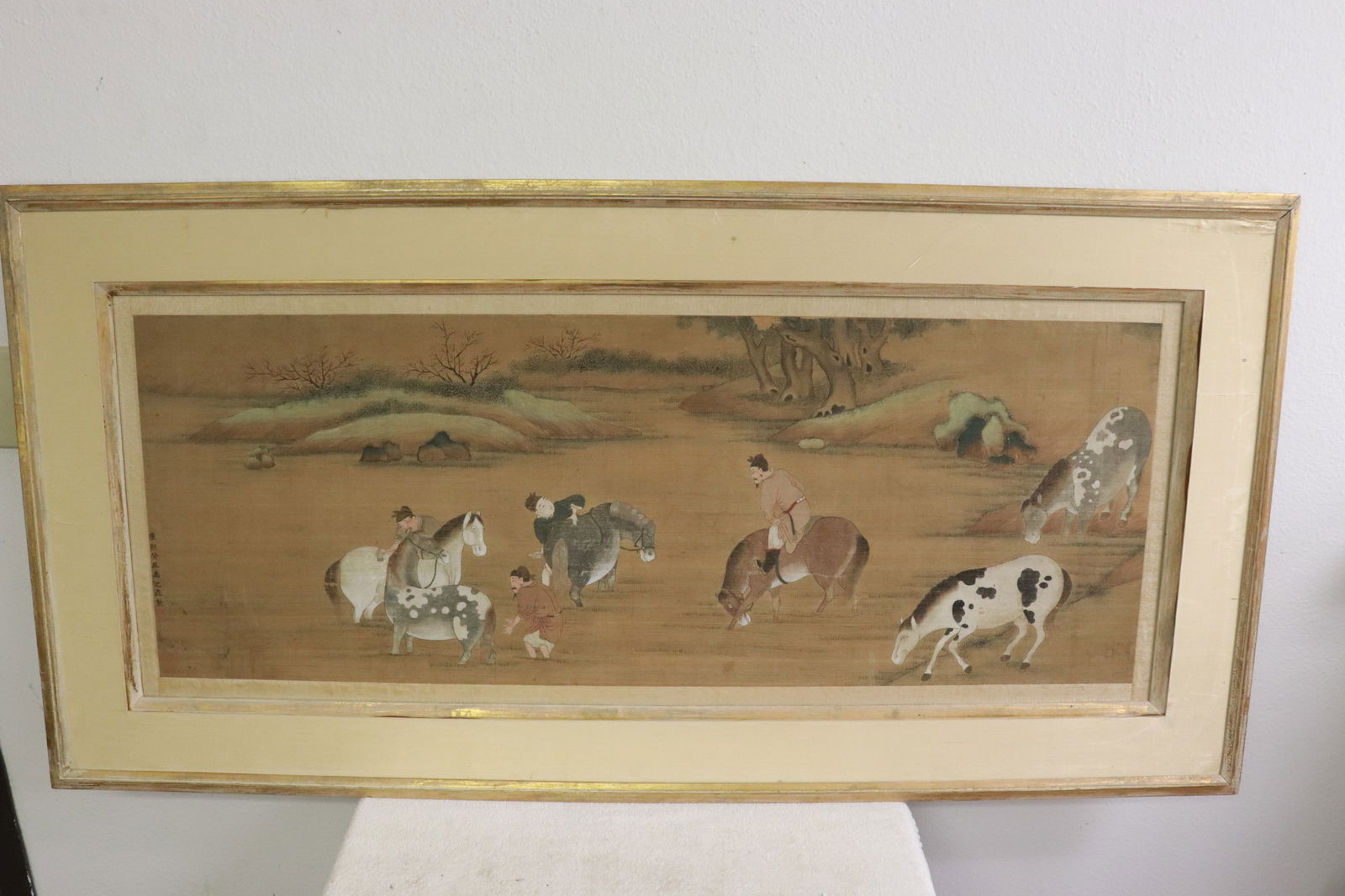 Chinese antique watercolor on silk pasted on board: Very fine Chinese antique watercolor (16.75"x42.5") on silk pasted on board (25.4"x51.3"x0.75"), depicting hunting scene