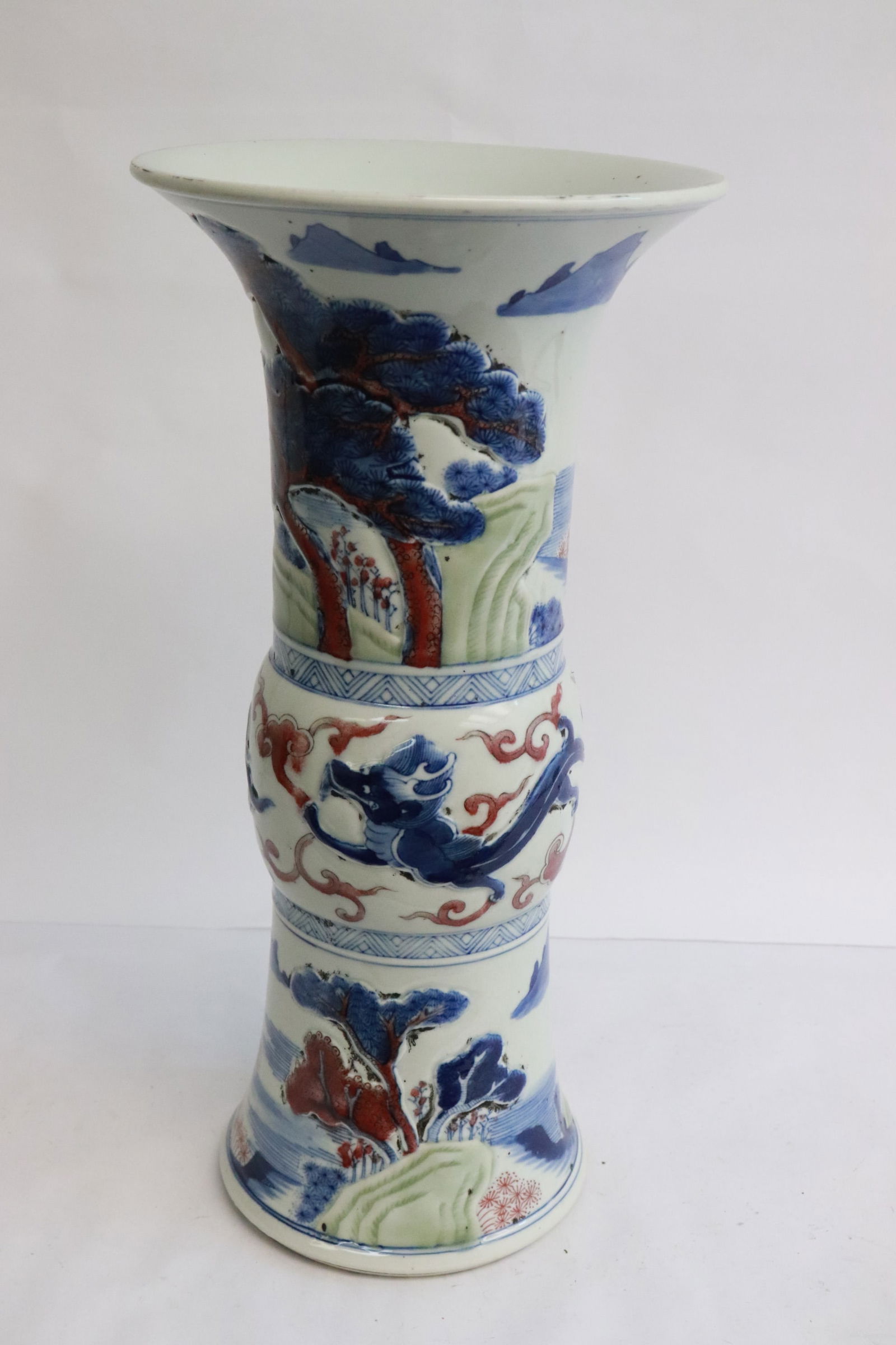 Chinese 18th c. porcelain trumpet vase: A beautiful Chinese 18th century famille rose porcelain trumpet vase with decoration in low relief, 13.35"x6.6"dia