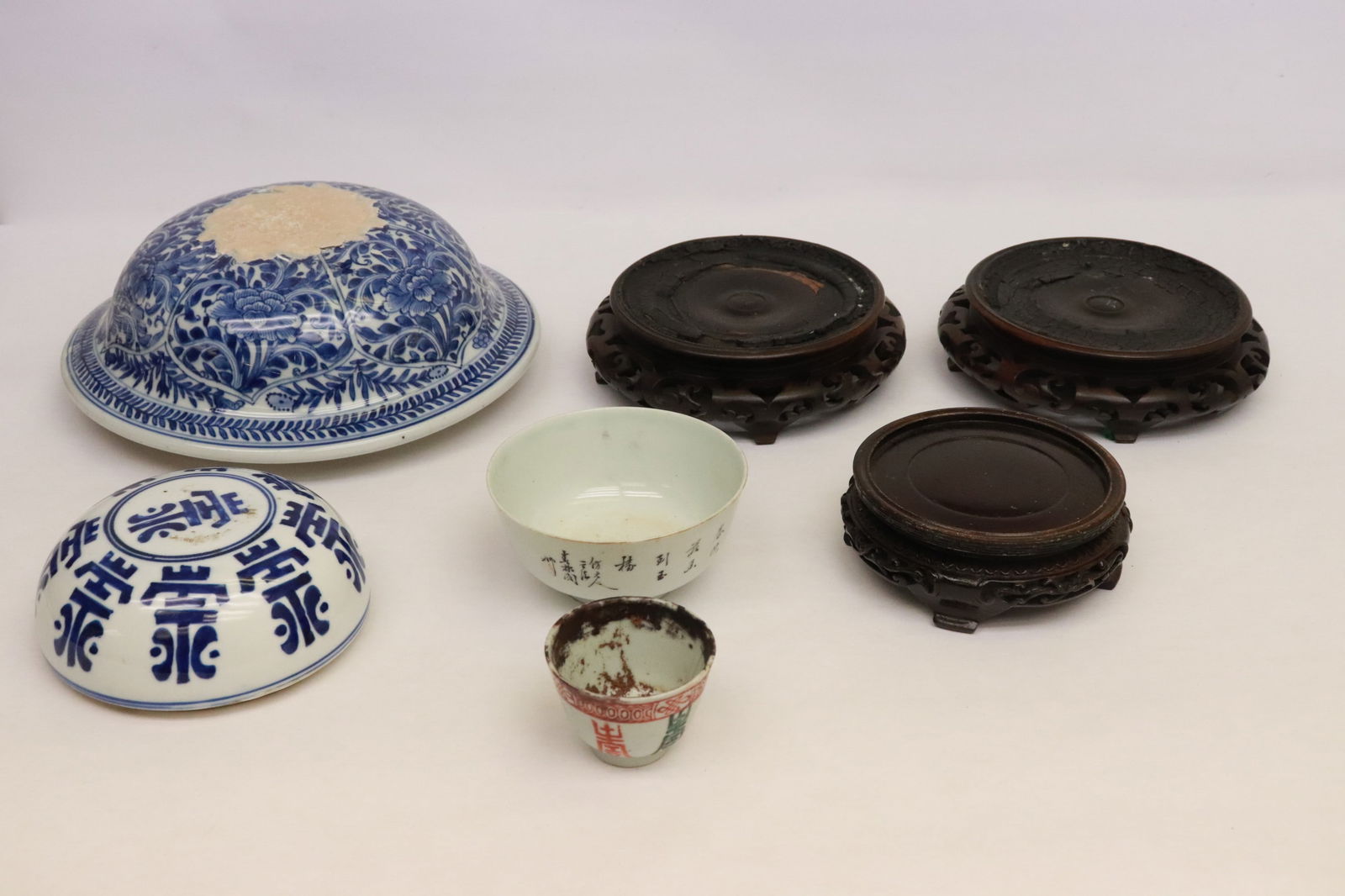 Lot of Chinese porcelain/ porcelain parts & wood stands (1 of 8)