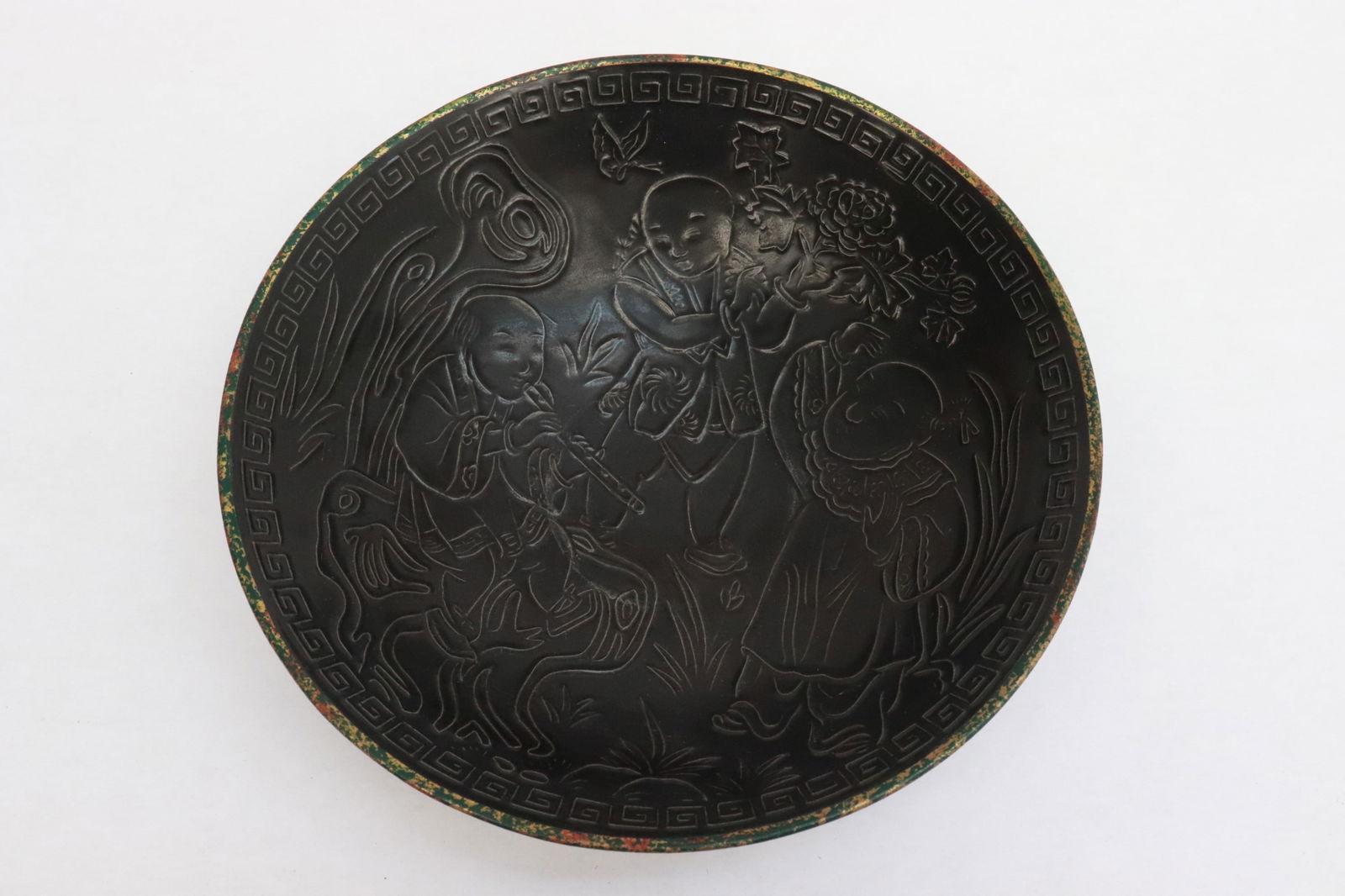 Brown glazed porcelain bowl: Brown glazed porcelain bowl with embossed decoration, 2.35"x8.9"dia