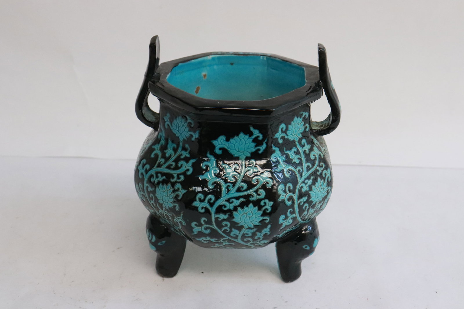 A blue on black tripod porcelain censer: A blue on black tripod porcelain censer, 5.65"x4.7"x4.65"
