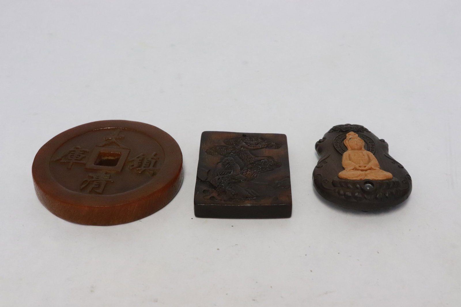 3 amber like plaques: 3 amber like plaques, 2.5"x1.85"x0.3" - 0.5"x3"dia
